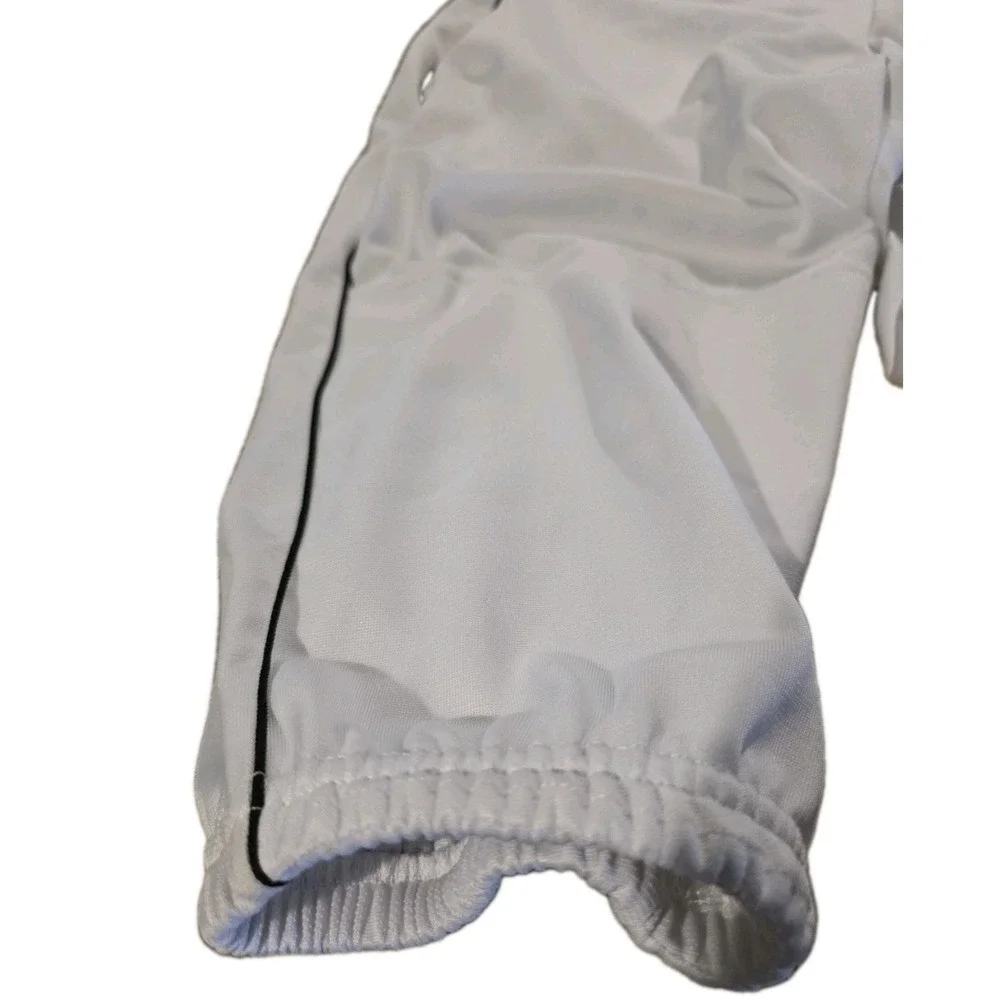 Under Armour branded inner waistband, tunnel belt loops, double snap closure. LG